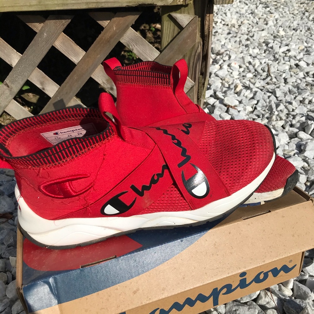 “Champion shoes”.  Size: 11.   (Comes with box)